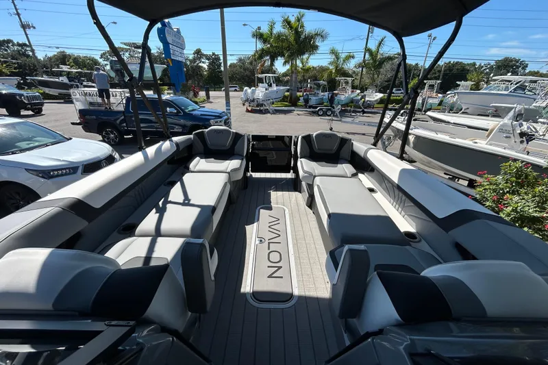  Yacht Photos Pics 2026 Avalon Excalibur 27-foot boat interior with luxurious seating and modern design.