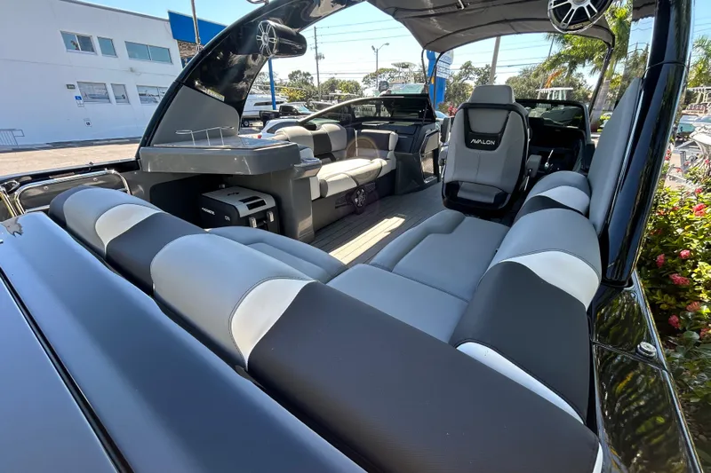  Yacht Photos Pics Luxurious interior of 2026 Avalon Excalibur 27-foot boat with sleek seating and modern design.