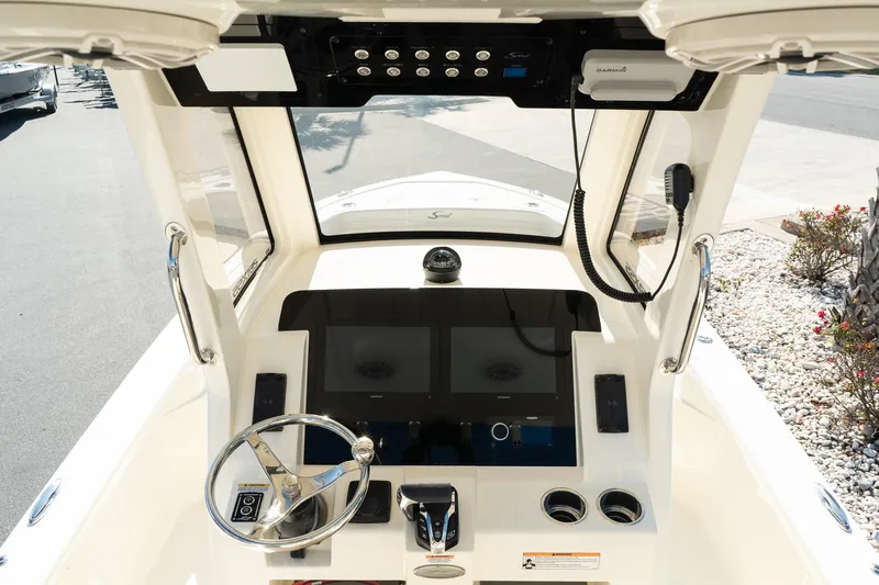  Yacht Photos Pics 2025 Scout 261 XSS boat dashboard with modern controls and dual screens.