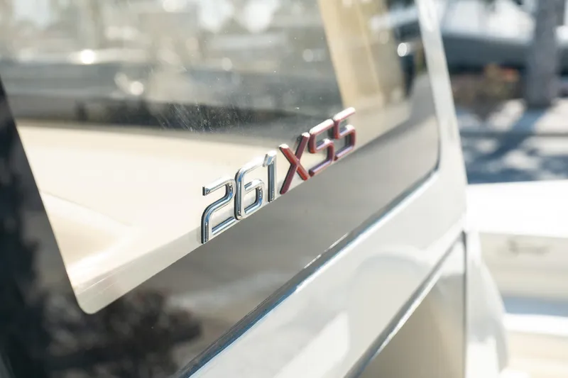  Yacht Photos Pics Close-up of 2025 Scout 261 XSS boat model emblem.