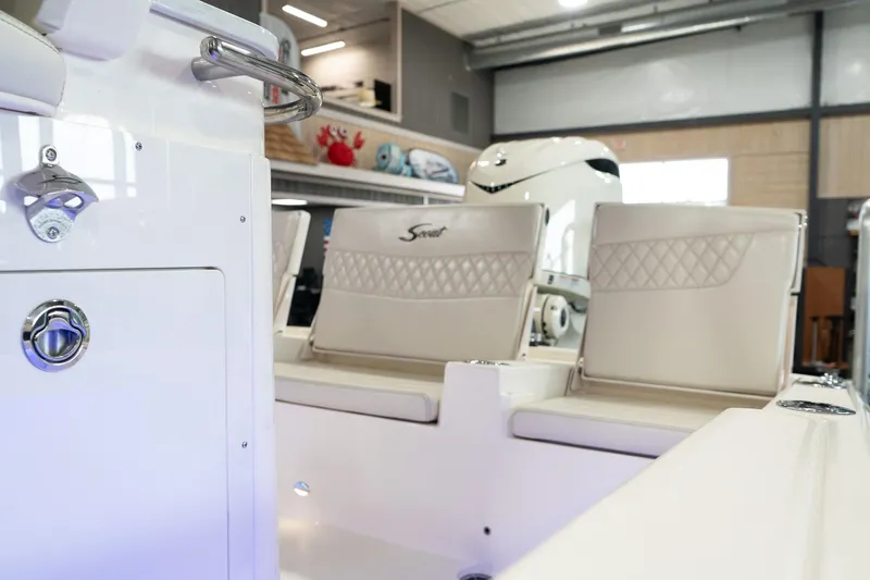  Yacht Photos Pics 2025 Scout 261 XSS boat interior with white seating and modern design.