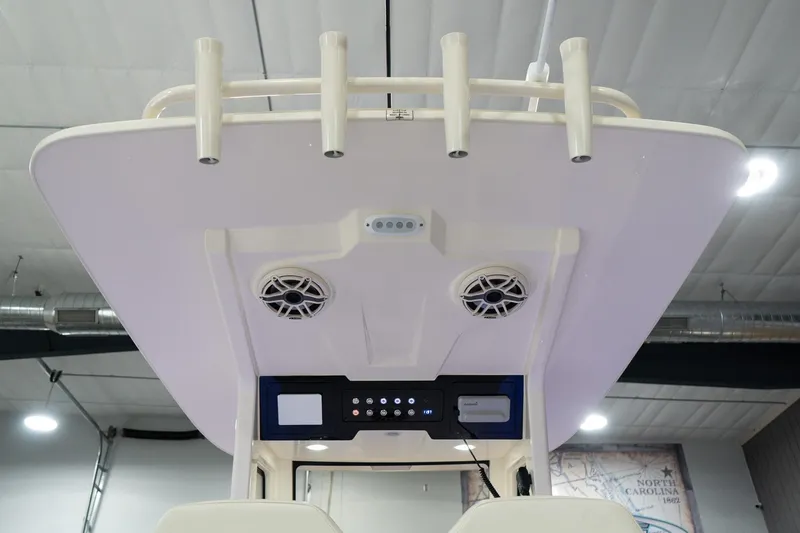  Yacht Photos Pics 2025 Scout 261 XSS boat interior with speakers and control panel.