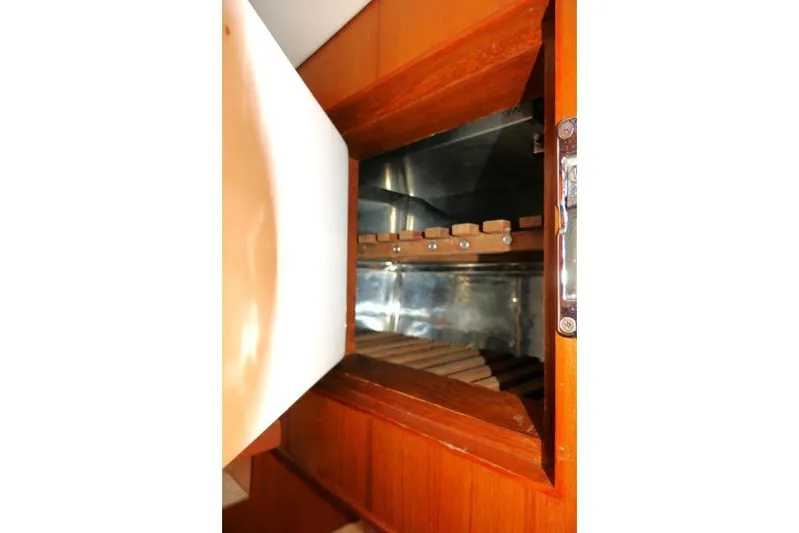 Peregrine Yacht Photos Pics Interior view of a 2002 Tayana 460 Vancouver Pilothouse wooden cabinet.