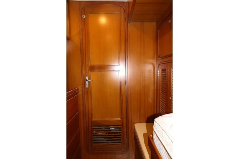 Peregrine Yacht Photos Pics Wooden interior door in 2002 Tayana 460 Vancouver Pilothouse yacht cabin.
