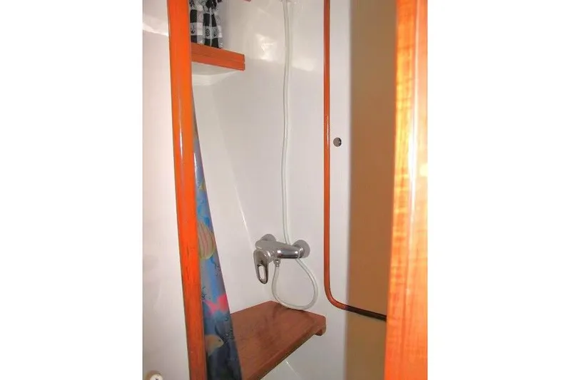 Peregrine Yacht Photos Pics Shower area in 2002 Tayana 460 Vancouver Pilothouse yacht with wooden accents.