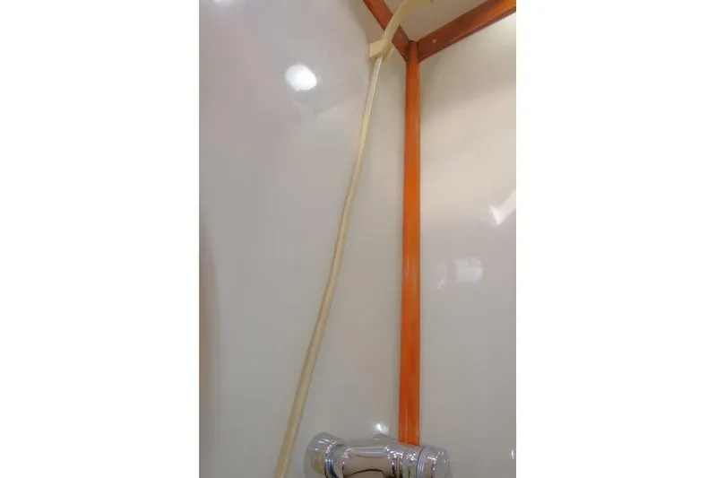 Peregrine Yacht Photos Pics Shower area in 2002 Tayana 460 Vancouver Pilothouse yacht with wooden trim.