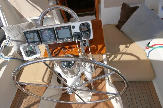 Peregrine Yacht Photos Pics Pilothouse of 2002 Tayana 460 Vancouver, featuring steering wheel and navigation instruments.