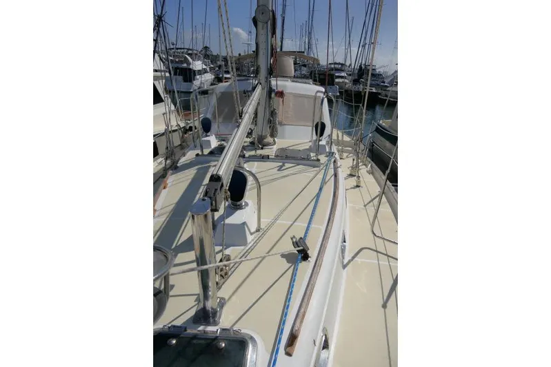 Peregrine Yacht Photos Pics 2002 Tayana 460 Vancouver Pilothouse sailboat deck with rigging in marina.