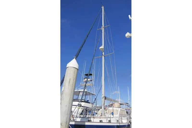 Peregrine Yacht Photos Pics Sailboat Tayana 460 Vancouver Pilothouse 2002 docked under clear blue sky.