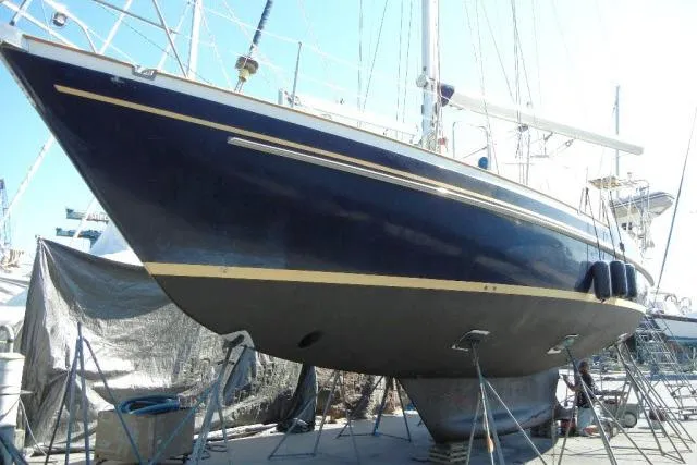 Peregrine Yacht Photos Pics 2002 Tayana 460 Vancouver Pilothouse sailboat on dry dock, side view.