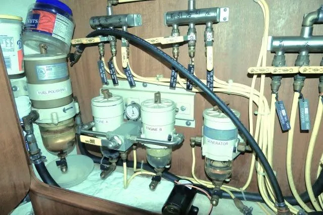 Peregrine Yacht Photos Pics Fuel system components in a 2002 Tayana 460 Vancouver Pilothouse yacht engine room.