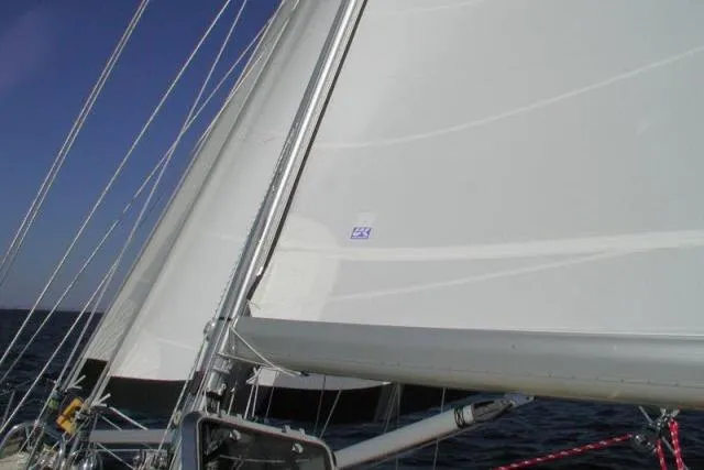 Peregrine Yacht Photos Pics Sailing yacht Tayana 460 Vancouver Pilothouse, 2002, with sails unfurled on open water.