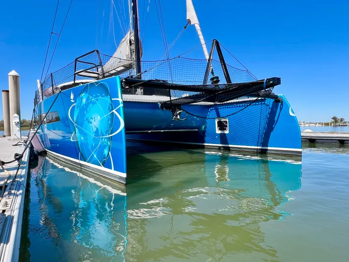 Silver Chain Yacht Photos Pics 2024 Balance 442 catamaran docked, featuring vibrant blue hull and modern design.