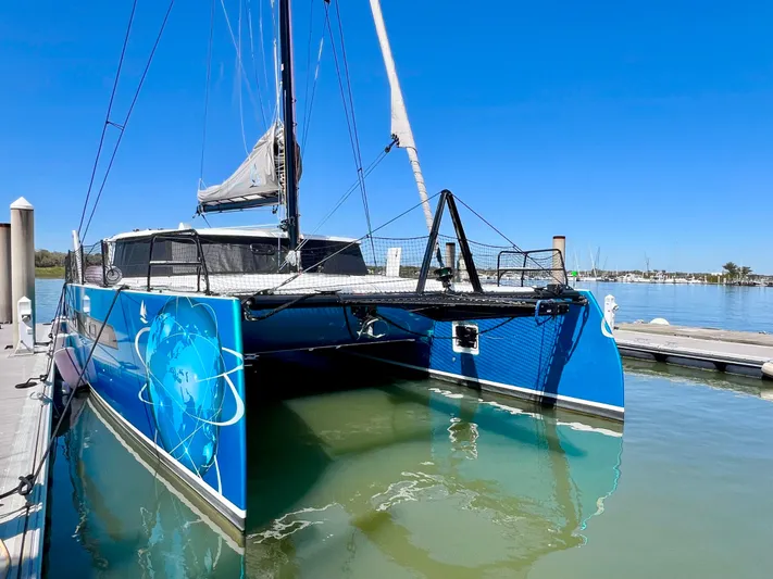 Silver Chain Yacht Photos Pics 2024 Balance 442 catamaran docked at marina under clear blue sky.