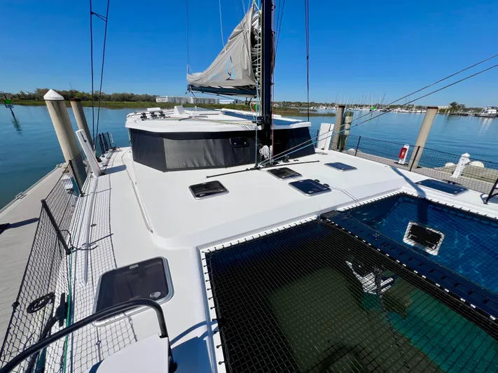 Silver Chain Yacht Photos Pics 2024 Balance 442 catamaran docked, showcasing deck and sail details under clear blue sky.