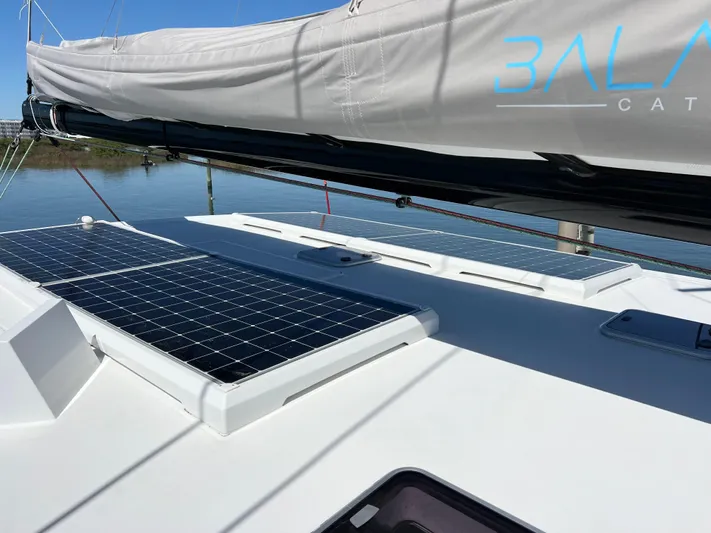 Silver Chain Yacht Photos Pics 2024 Balance 442 catamaran with solar panels on deck, featuring sleek design and modern technology.