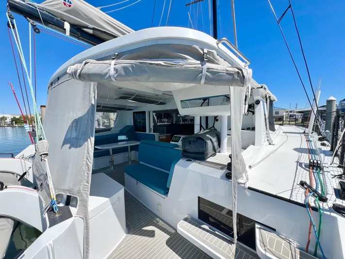 Silver Chain Yacht Photos Pics 2024 Balance 442 catamaran with spacious deck and modern seating under clear blue sky.