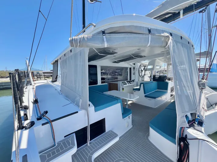 Silver Chain Yacht Photos Pics 2024 Balance 442 catamaran with spacious deck and modern seating in marina.
