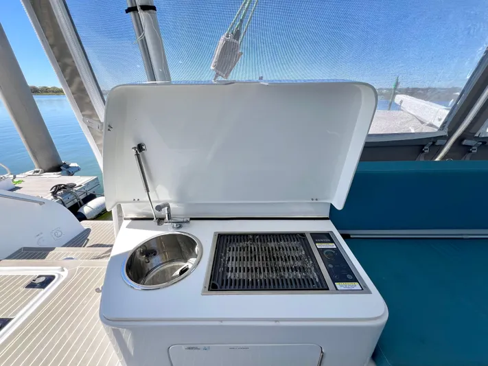 Silver Chain Yacht Photos Pics Outdoor kitchen on 2024 Balance 442 yacht with sink and grill.