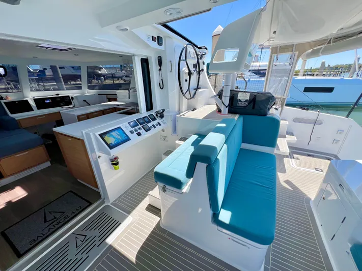 Silver Chain Yacht Photos Pics 2024 Balance 442 yacht interior with modern helm, seating, and navigation equipment.