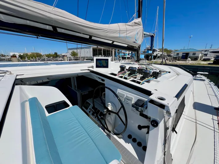 Silver Chain Yacht Photos Pics 2024 Balance 442 yacht cockpit with steering wheel and navigation equipment.