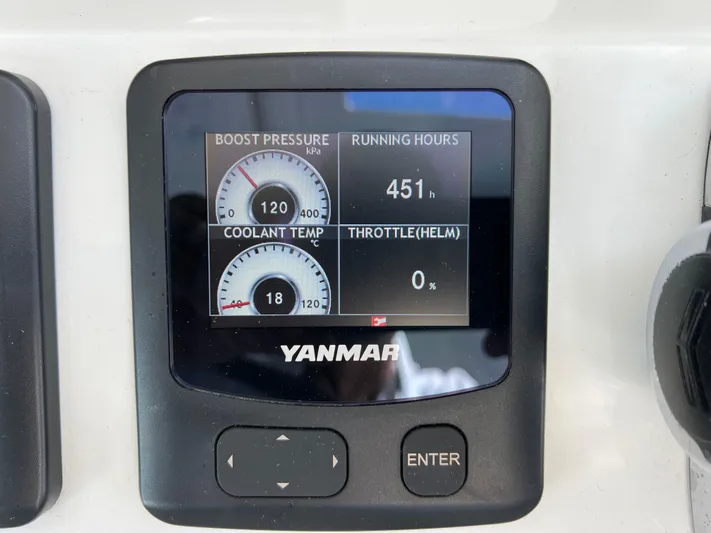 Silver Chain Yacht Photos Pics Yanmar engine display showing boost pressure, coolant temperature, running hours, and throttle status.