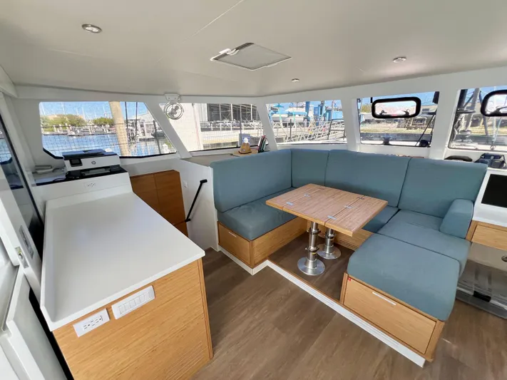 Silver Chain Yacht Photos Pics 2024 Balance 442 yacht interior with modern seating and dining area.