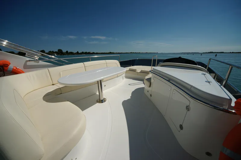  Yacht Photos Pics Luxurious 2009 VZ 68 yacht deck with elegant seating and ocean view.
