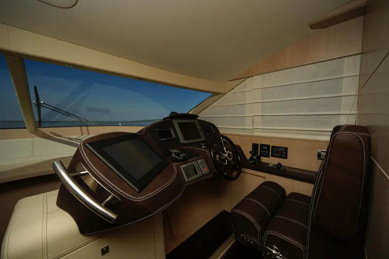  Yacht Photos Pics Luxurious VZ 68 yacht cockpit interior with modern navigation equipment, 2009 model.