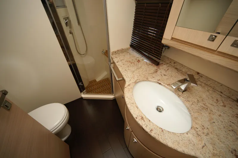  Yacht Photos Pics Luxurious bathroom in 2009 VZ 68 yacht with granite countertop and modern fixtures.