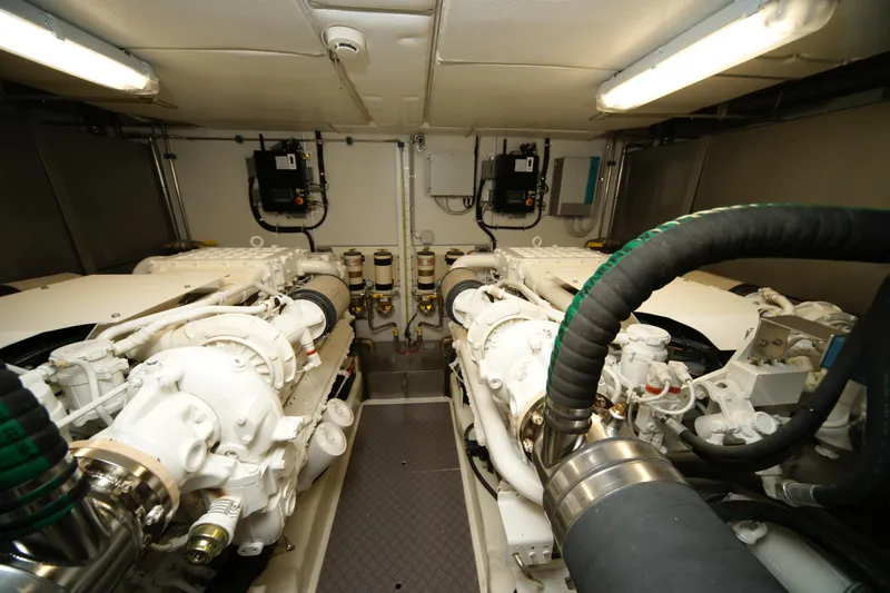  Yacht Photos Pics Engine room of 2009 VZ 68 yacht with dual engines and mechanical components.