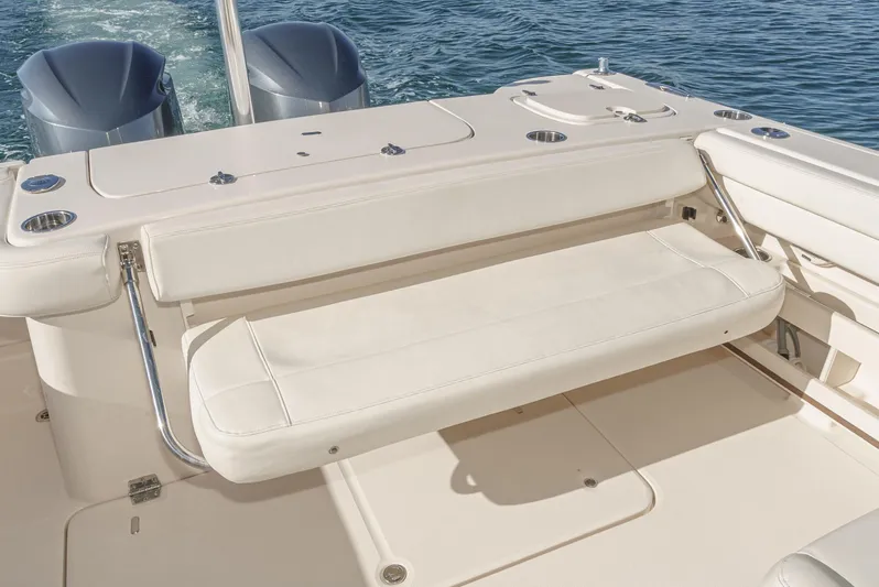  Yacht Photos Pics 2018 Grady-White Freedom 307 boat with foldable seating and twin engines on the water.