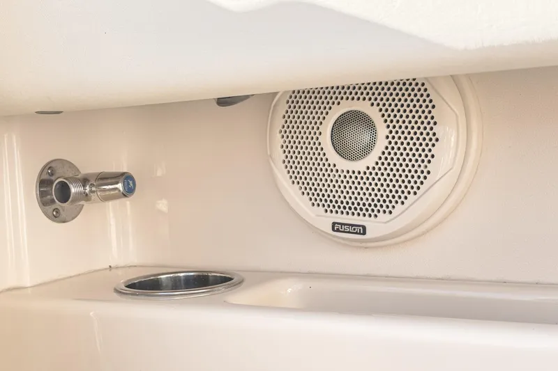  Yacht Photos Pics 2018 Grady-White Freedom 307 boat interior with Fusion speaker and cup holder.