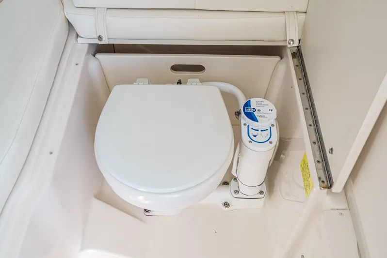  Yacht Photos Pics 2018 Grady-White Freedom 307 boat toilet, compact marine design.