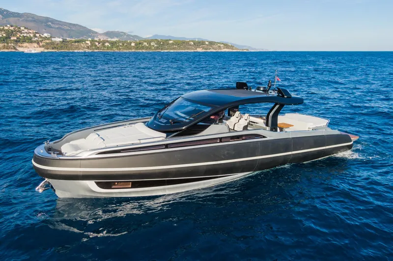 Ciao L Yacht Photos Pics 2022 SACS Rebel 55 luxury yacht cruising on blue ocean waters.