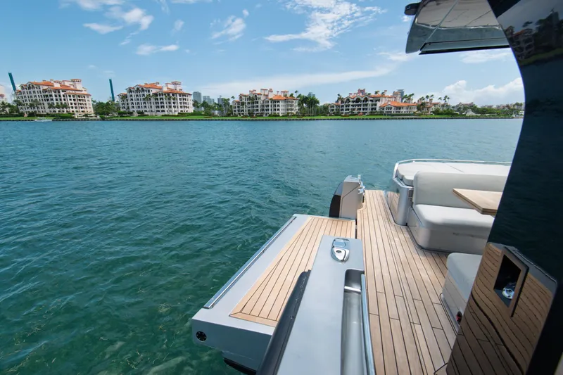 Ciao L Yacht Photos Pics Luxury SACS Rebel 55 yacht deck with waterfront view, 2022 model.