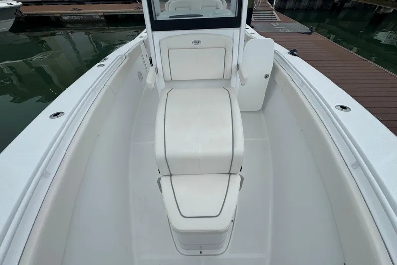  Yacht Photos Pics 2024 Sea Hunt Gamefish 27 Coffin Box boat interior, featuring spacious seating and sleek design.