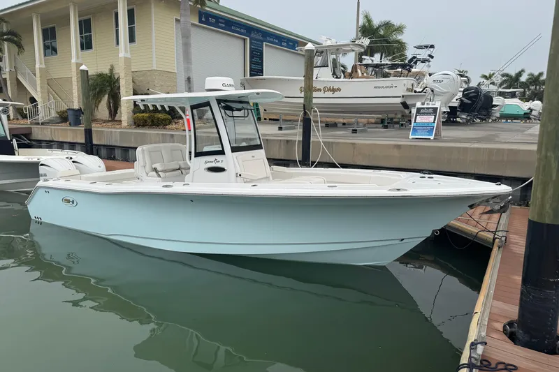  Yacht Photos Pics 2024 Sea Hunt Gamefish 27 Coffin Box boat docked at marina, side view.