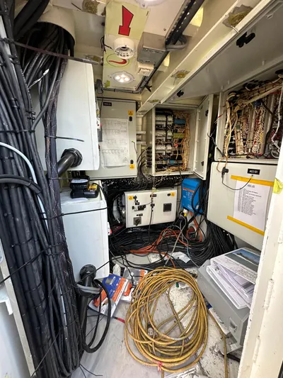 T1 Yacht Photos Pics Interior of 2009 Custom Aluminum Landing Craft with electrical wiring and control panels.