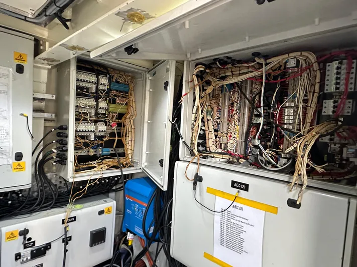 T1 Yacht Photos Pics Electrical panel inside 2009 Custom Aluminum Landing Craft, showcasing complex wiring and components.