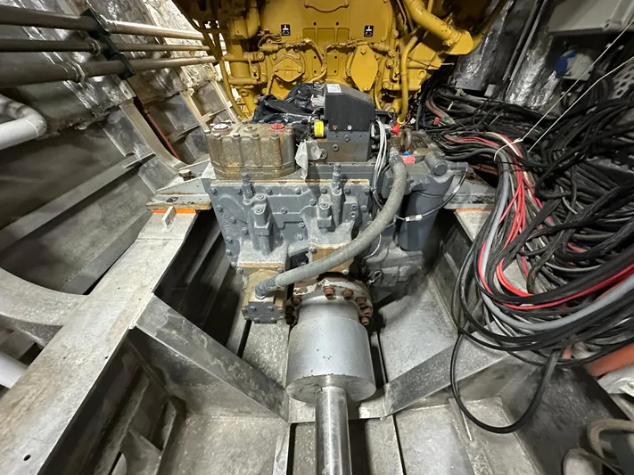 T1 Yacht Photos Pics Engine room of a 2009 Custom Aluminum Landing Craft, showcasing machinery and wiring.