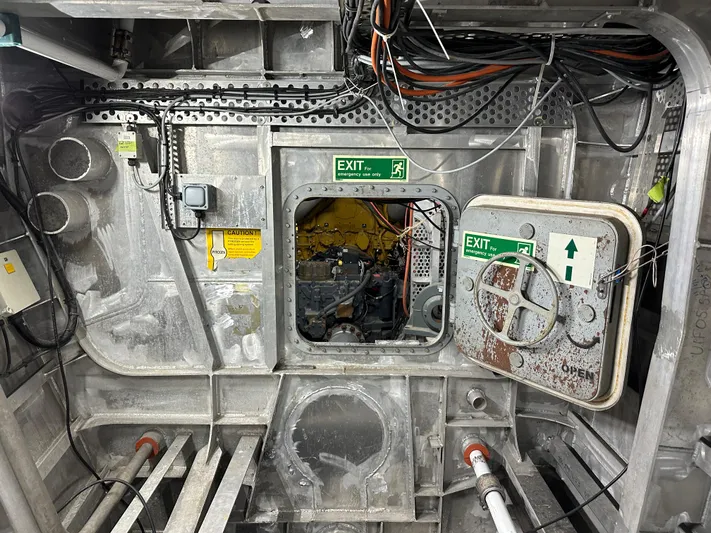 T1 Yacht Photos Pics Interior of 2009 Custom Aluminum Landing Craft with open exit hatch and visible wiring.