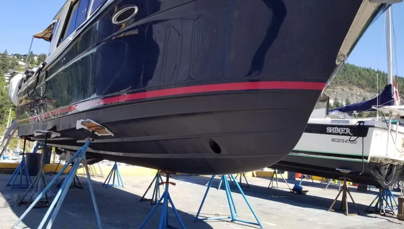 Denial Yacht Photos Pics 2012 Cutwater C-28 boat on stands in a marina, side view.