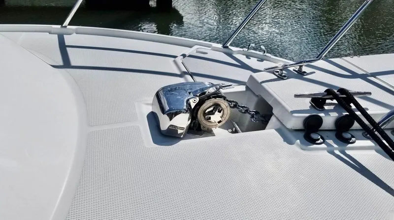 Denial Yacht Photos Pics 2012 Cutwater C-28 boat deck with anchor and chain mechanism.