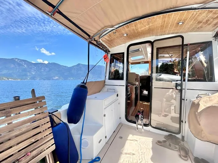 Denial Yacht Photos Pics 2012 Cutwater C-28 boat interior with scenic lake and mountain view.