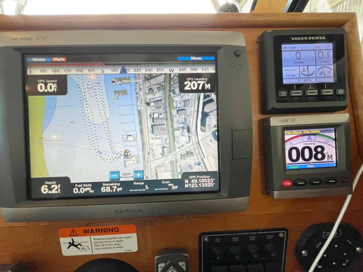 Denial Yacht Photos Pics Navigation system on a 2012 Cutwater C-28 boat displaying maps and data.