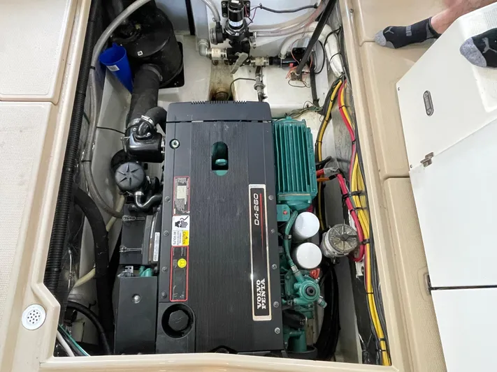 Denial Yacht Photos Pics 2012 Cutwater C-28 engine compartment with Volvo Penta motor, visible wiring, and components.