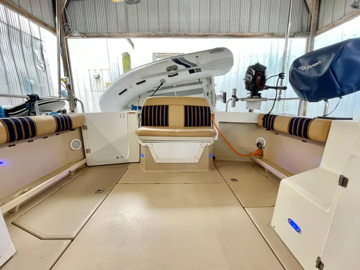 Denial Yacht Photos Pics 2012 Cutwater C-28 boat interior with seating and equipment.