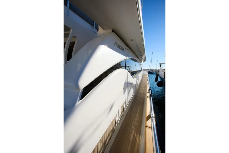 Pobedy I Yacht Photos Pics Luxurious 2004 Maiora 26.5 yacht docked, showcasing sleek design and elegant craftsmanship.