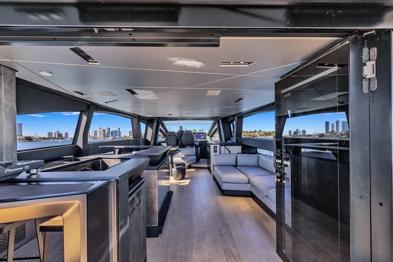  Yacht Photos Pics Luxurious interior of 2025 Pershing GTX 80 yacht with modern design and city skyline view.